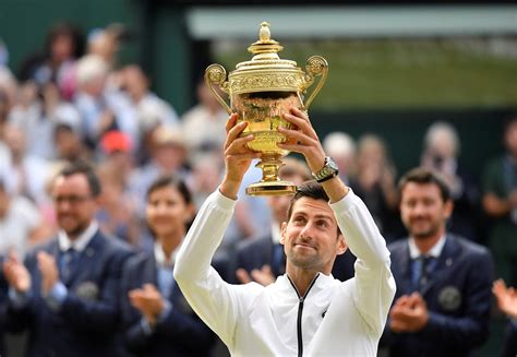 Novak Djokovic Wins Wimbledon, Outlasting Roger .